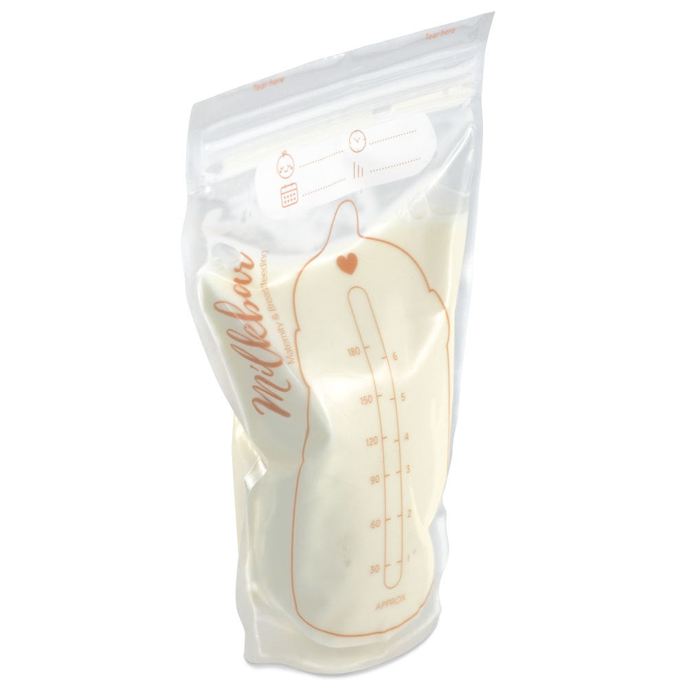 A clear plastic milk storage bag with a baby bottle-shaped measurement graphic and the brand name 'milkbar' printed in brown on a white background.
