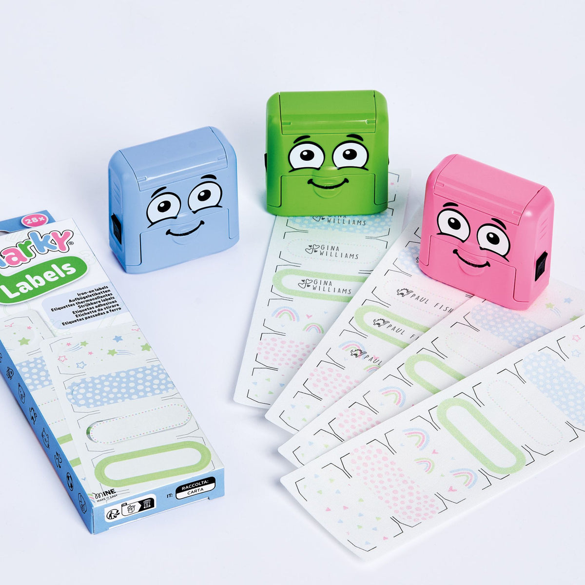 Colorful label makers with DIY Marky  labels on a white background