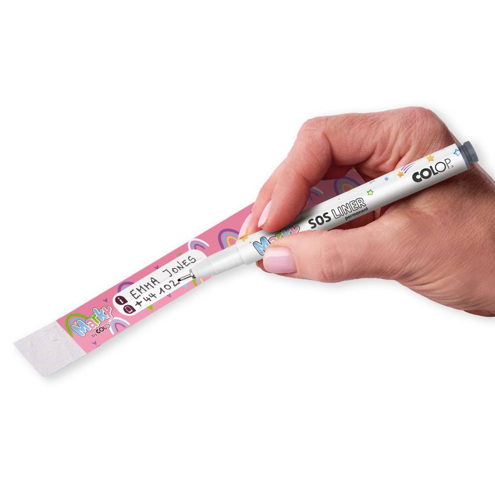 Hand holding a pink and white marker with colorful text on a white background