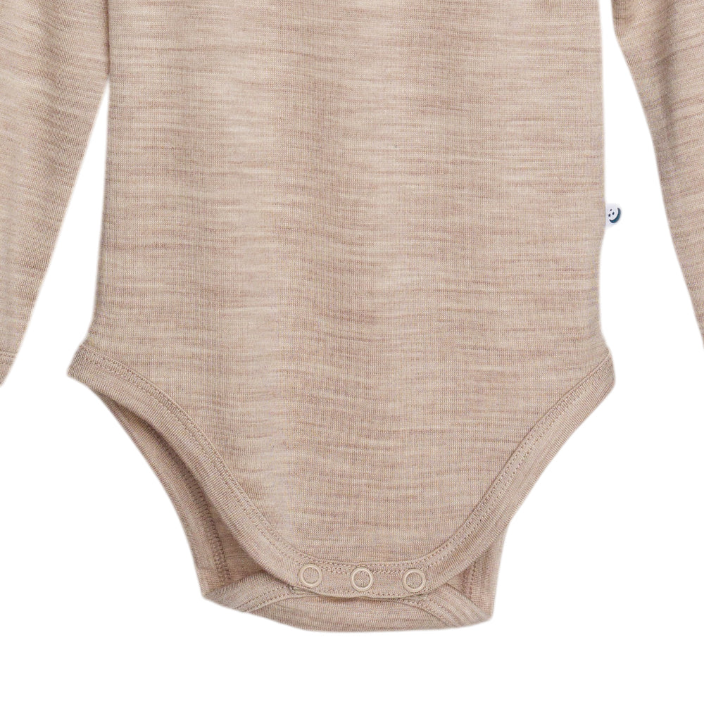 Beige baby bodysuit with long sleeves on a white background
