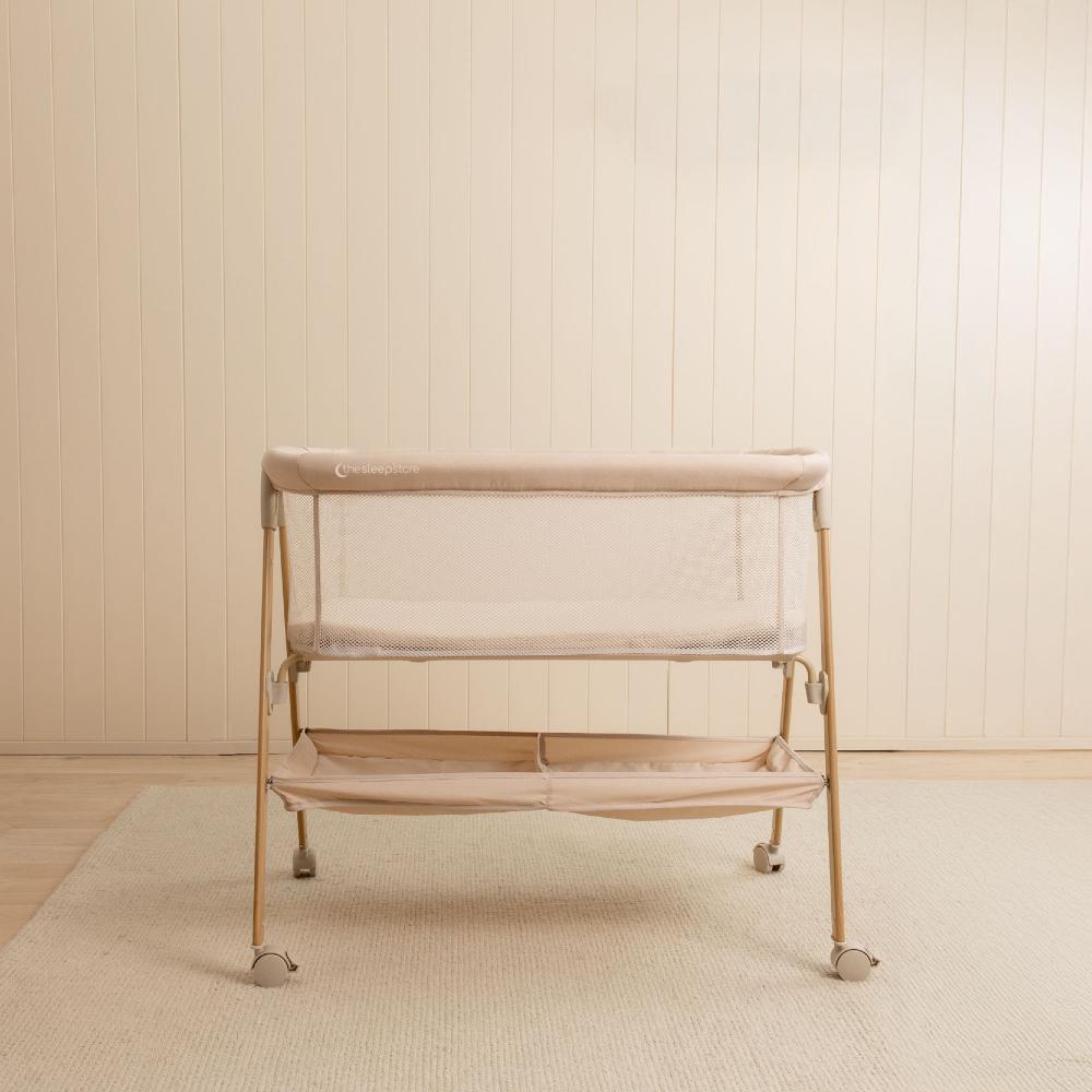 Beige Bassinet in a nursery setting