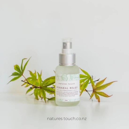 Natures Touch glass spray bottle against white background.
