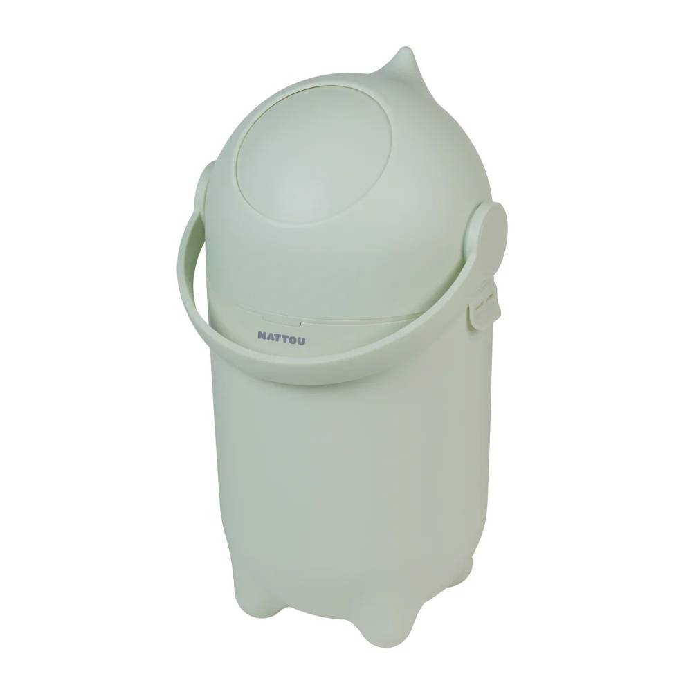 Sage green nappy bin with lid on a white background