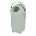 Sage green nappy bin with handle on a white background
