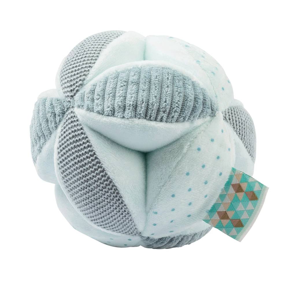 Textured ball-shaped toy with a tag on a white background