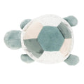 Plush turtle toy with green and beige pattern on a white background