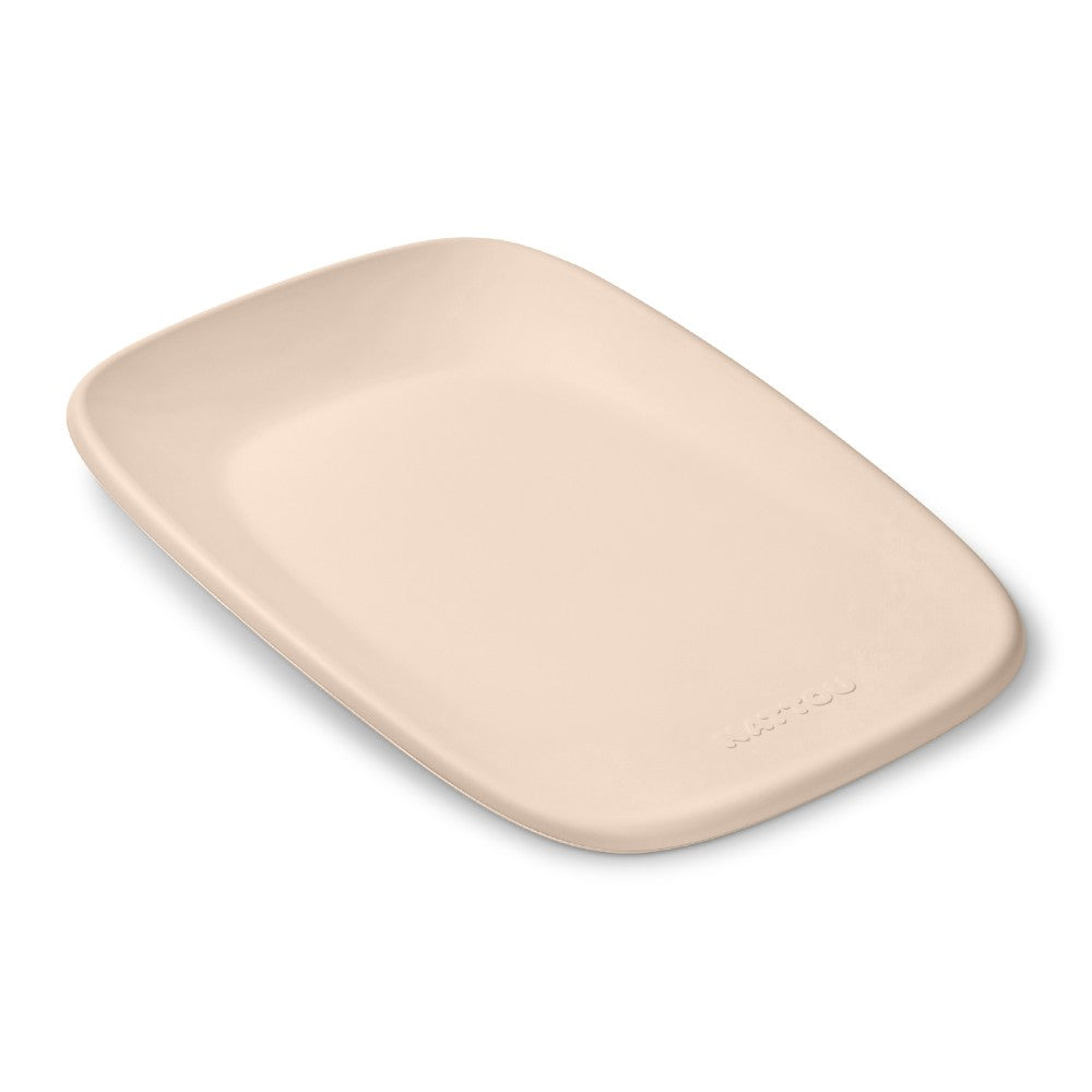 Beige change mat for baby on a white background