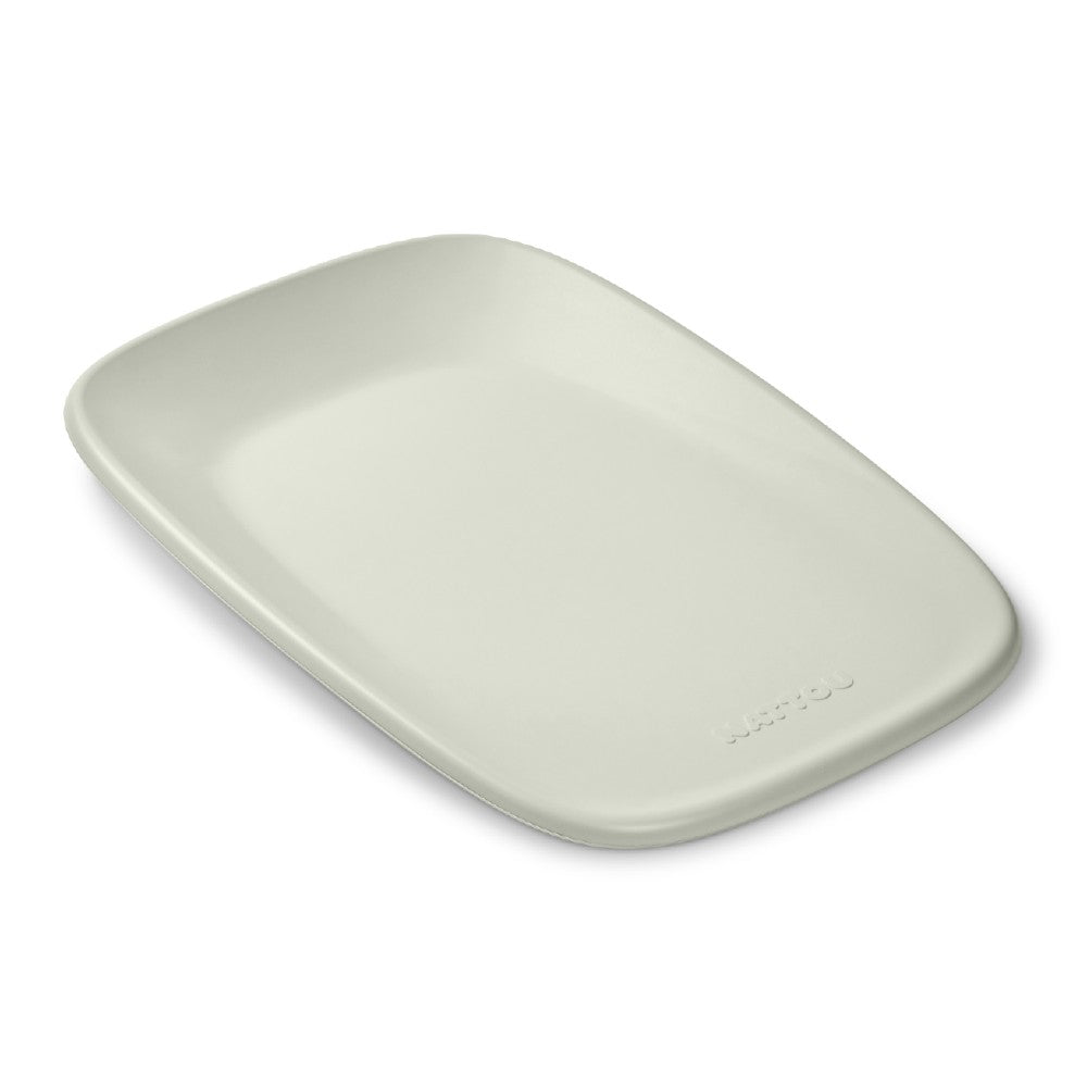 Rectangular sage green baby change mat a white background