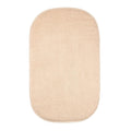 Beige changing mat cover on a white background