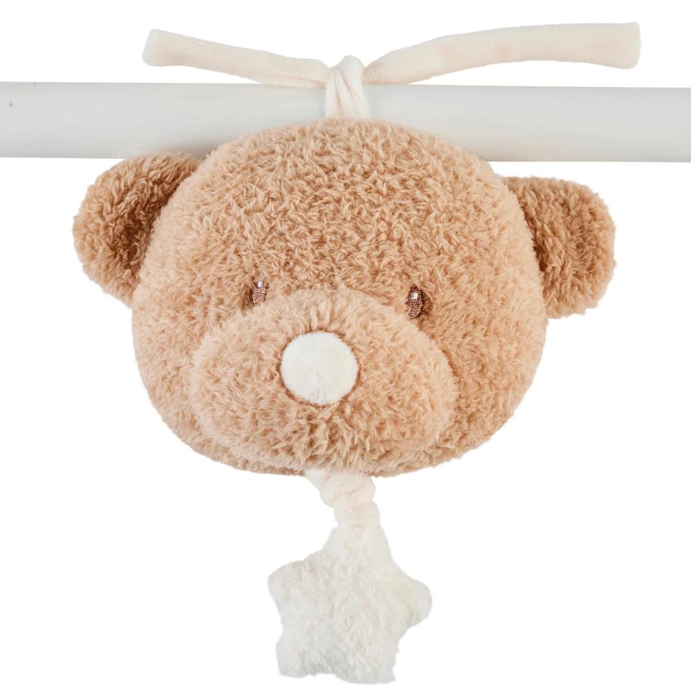 Plush musical teddy bear toy with a white background