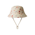 Cotton sunhat with a floral pattern on a white background. 