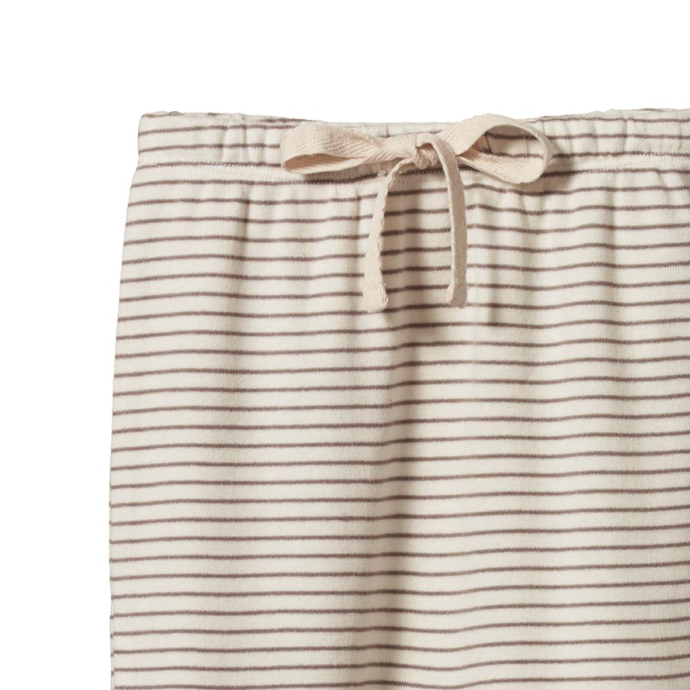Cream and brown striped pants with a tie waist on a white background