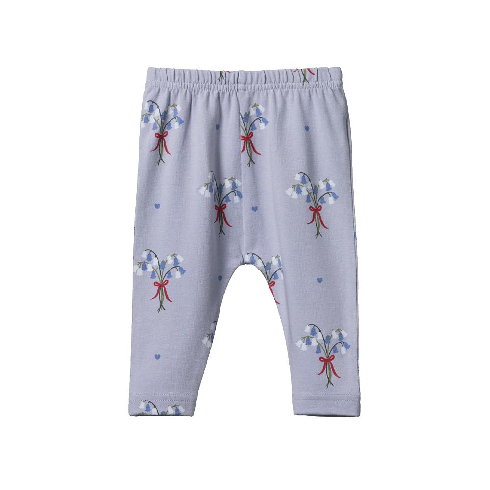 Light blue baby leggings with bluebell floral patterns with red bows on a white background