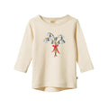 Cotton cream coloured long-sleeve shirt with bluebell floral design and red bow on a white background