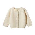 Cream coloured baby knitted cardigan with button details on a white background