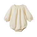 Beige baby bodysuit with long sleeves on a white background