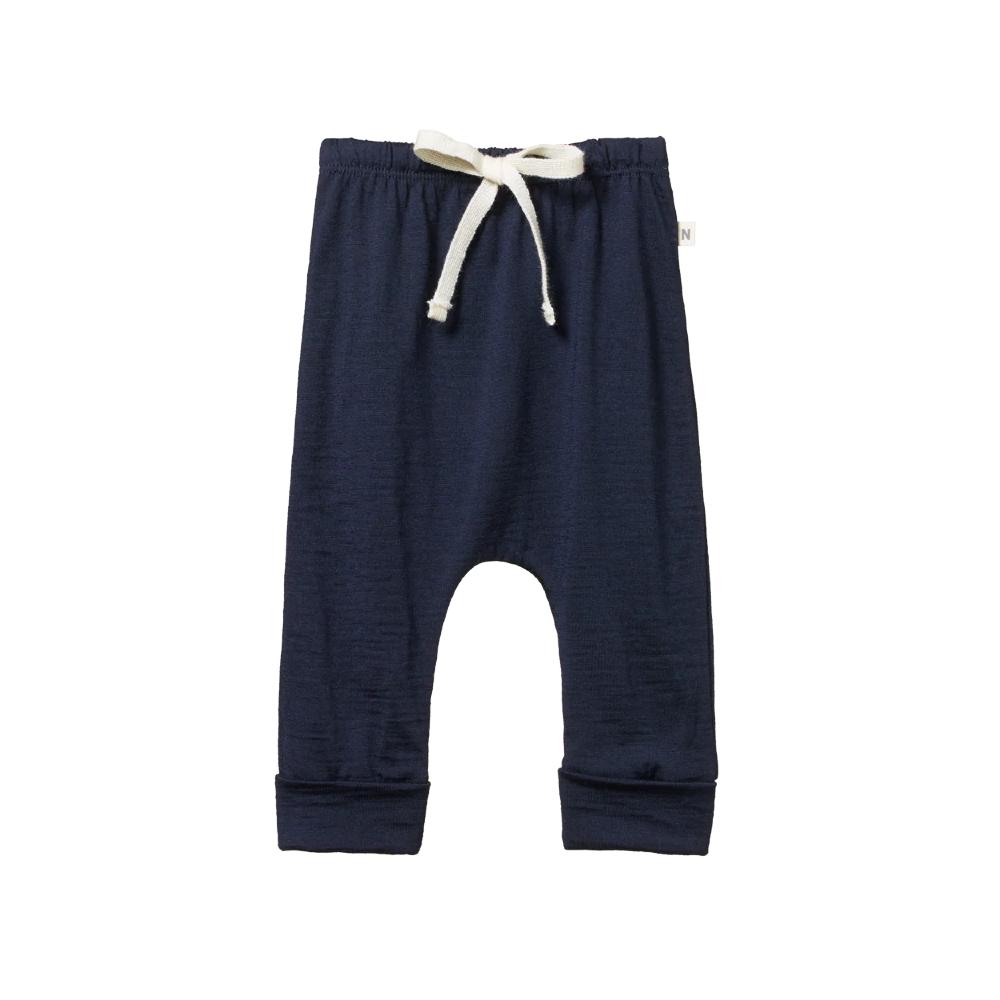 Merino wool navy blue baby pants with a white drawstring on a white background