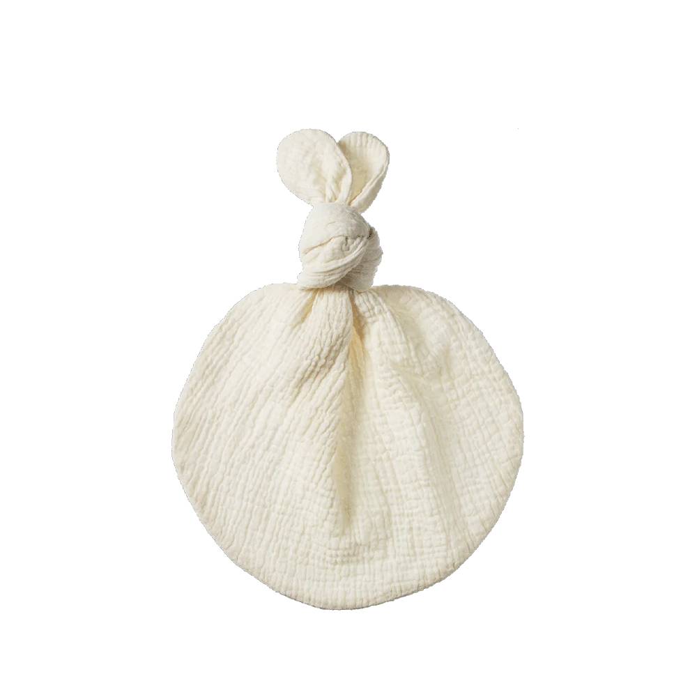 White muslin fabric comforter with knot on a white background