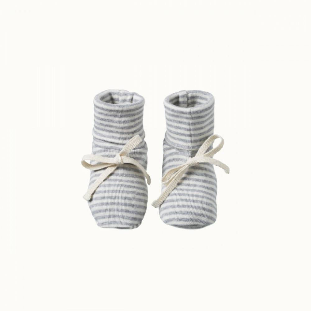 Pair of organic cotton grey striped baby booties with white calico laces on a white background