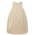A sleeveless baby sleep bag in a warm beige color, featuring a small all-over print of geese, shown flat against a white background.