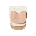 Three organic cotton dribble bibs in pink, cream and beige on a white background with nature baby packaging.