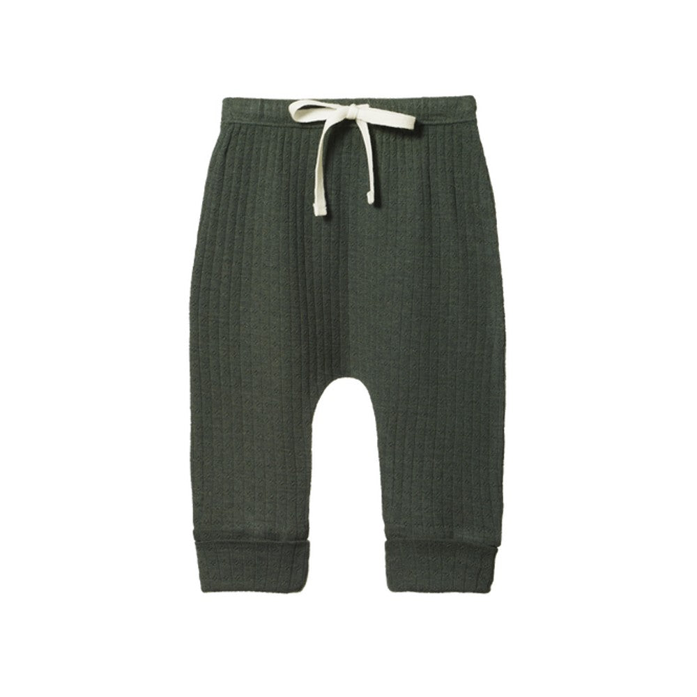 Forest green pointelle merino wool baby pants with a white drawstring on a white background