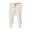 White ribbed pointelle cotton baby  footed pants with a drawstring on a white background