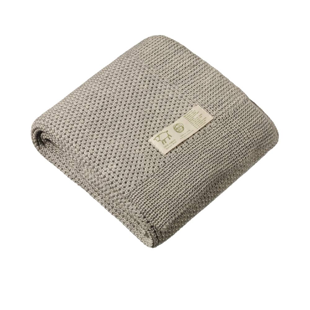 Woolen grey Nature Baby knitted blanket with a label on a white background
