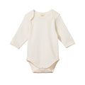 Cream coloured cotton baby bodysuit with long sleeves and envelope neck on a white background