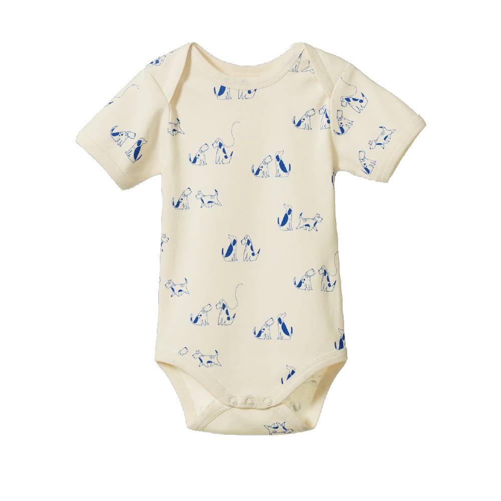A short-sleeve baby bodysuit in cream with a blue line-art print of dogs, shown flat against a white background.