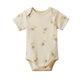 A short-sleeve baby bodysuit in cream with a repeating pattern of small striped fish in yellow, blue, and white, shown flat against a solid white background.