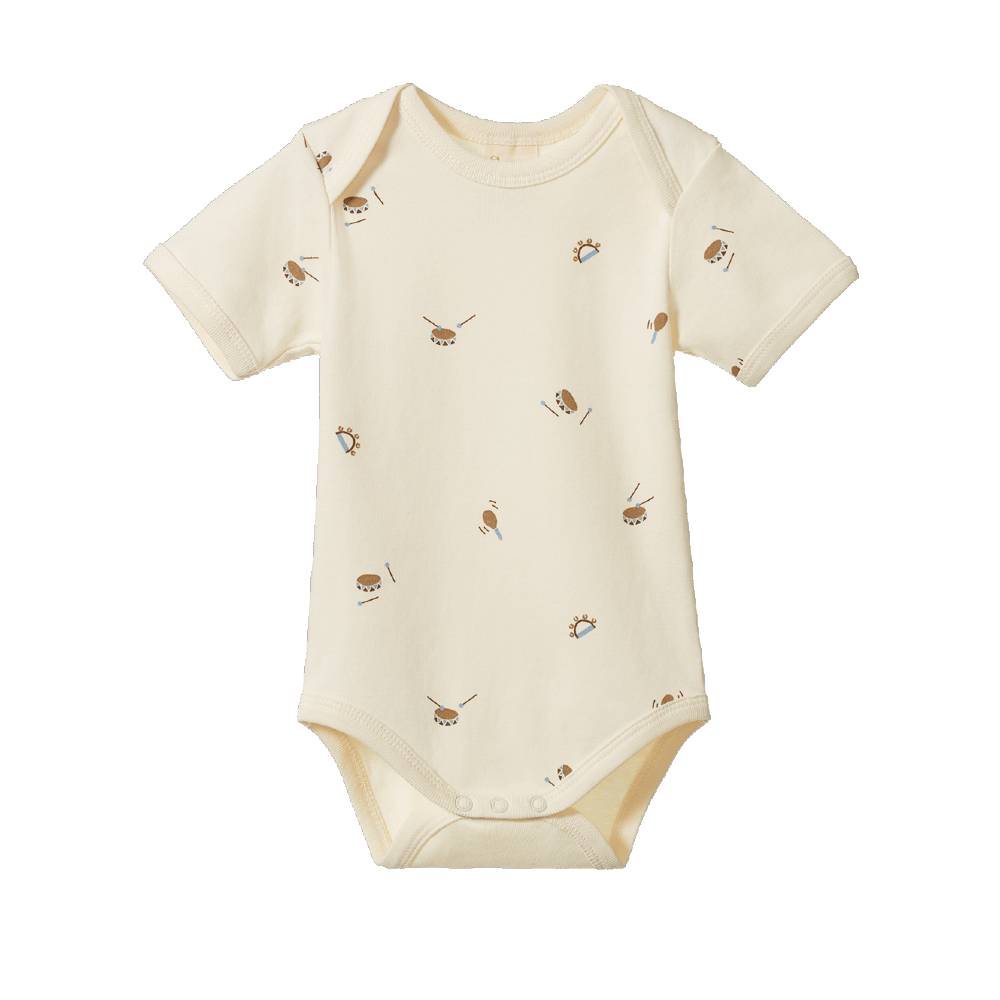 A short-sleeve baby bodysuit in cream with a scattered print of small brown instruments, shown flat against a white background.