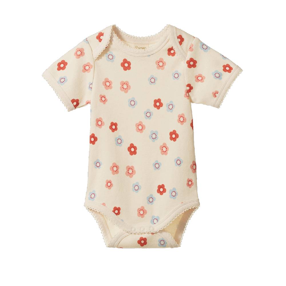 A short-sleeve cream-colored baby bodysuit with a delicate scalloped trim and an all-over pattern of small red, pink, and blue flowers, shown flat on a white background.