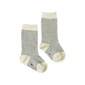 Pair of cotton navy and cream striped socks on a white background