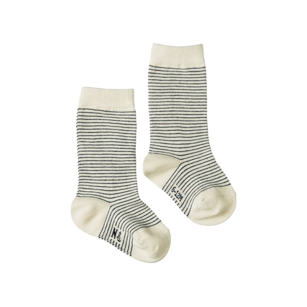 Pair of cotton navy and cream striped socks on a white background