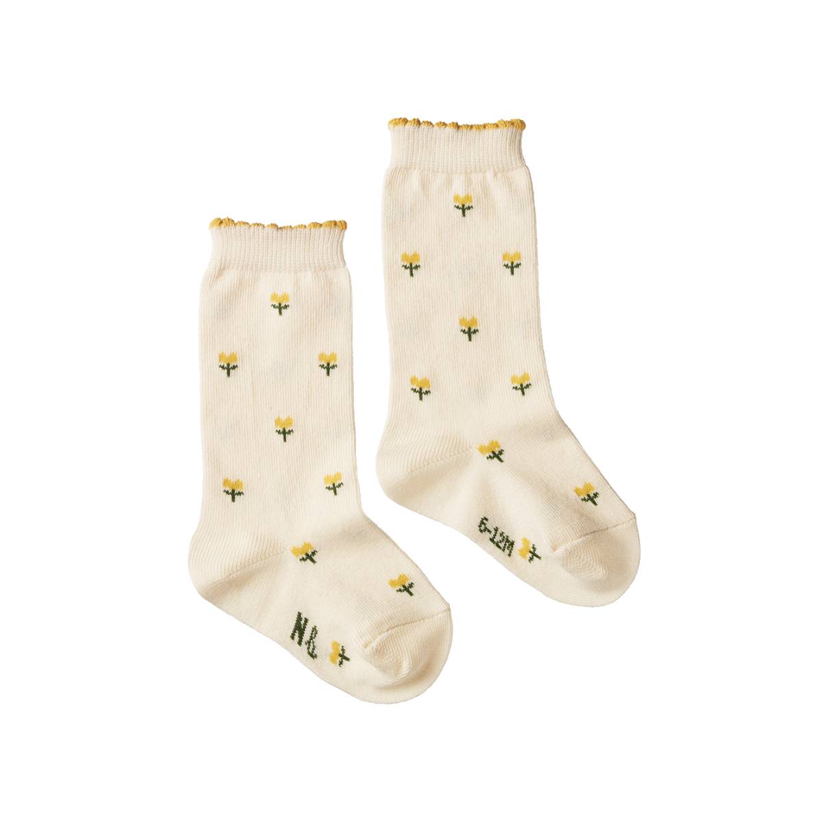 Pair of cream socks with yellow floral pattern and yellow trim on a white background