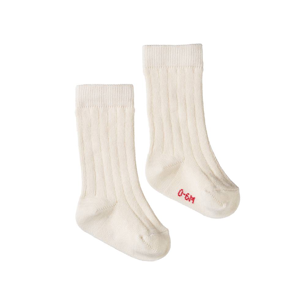 Pair of cream cotton rib socks with red  sizing printed on the feet on a white background