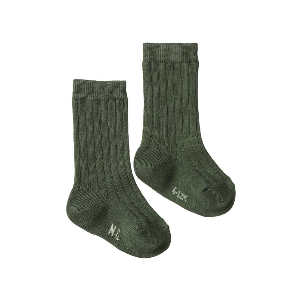 Pair of green cotton rib socks with 'Nb' printed on foot on a white background