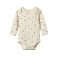 Cream pointelle cotton baby  longsleeve bodysuit with smallpurple berry patterns on a white background