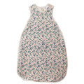 Cream with purple/pink/green Floral patterned cotton and merino baby sleeping bag on a white background