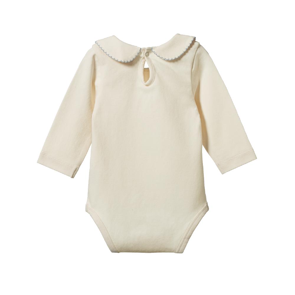 Cream coloured baby bodysuit with a collar and keyhole back on a white background