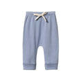 Light blue nature baby cotton baby pants with a beige drawstring on a white background