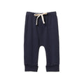 Navy nature baby cotton baby pants with a drawstring on a white background
