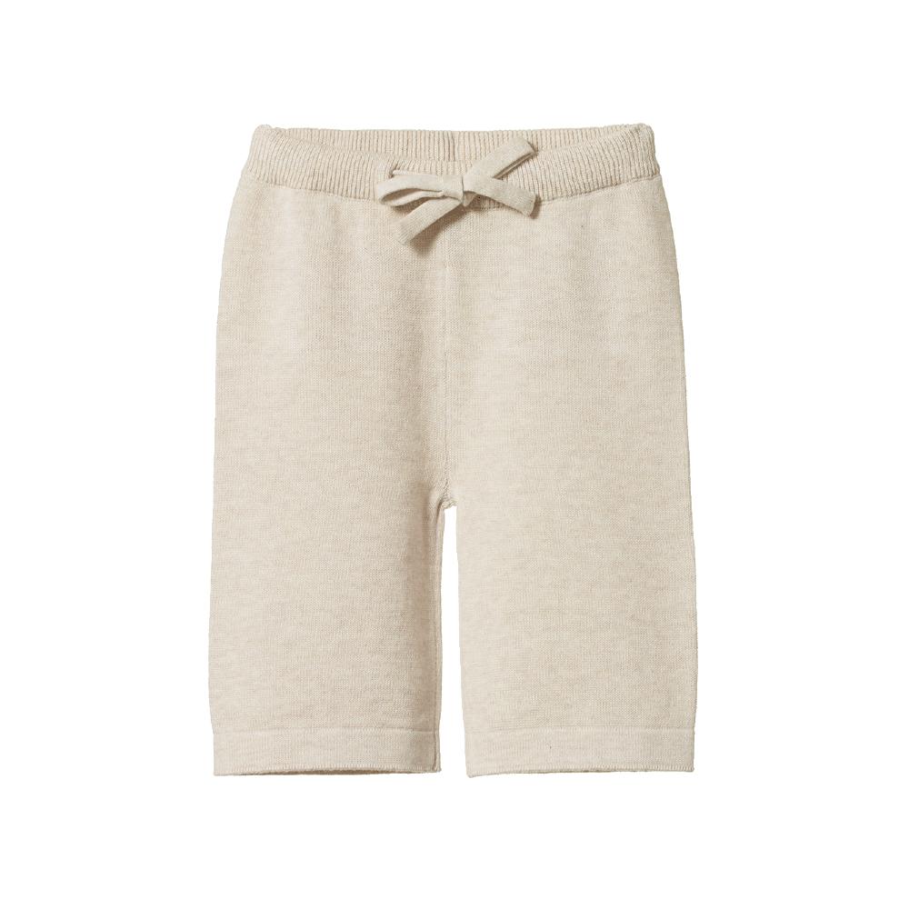 Beige baby knitted pants with a drawstring on a white background