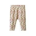 A pair of baby leggings with an elastic waistband, featuring a colorful floral pattern on a cream background.