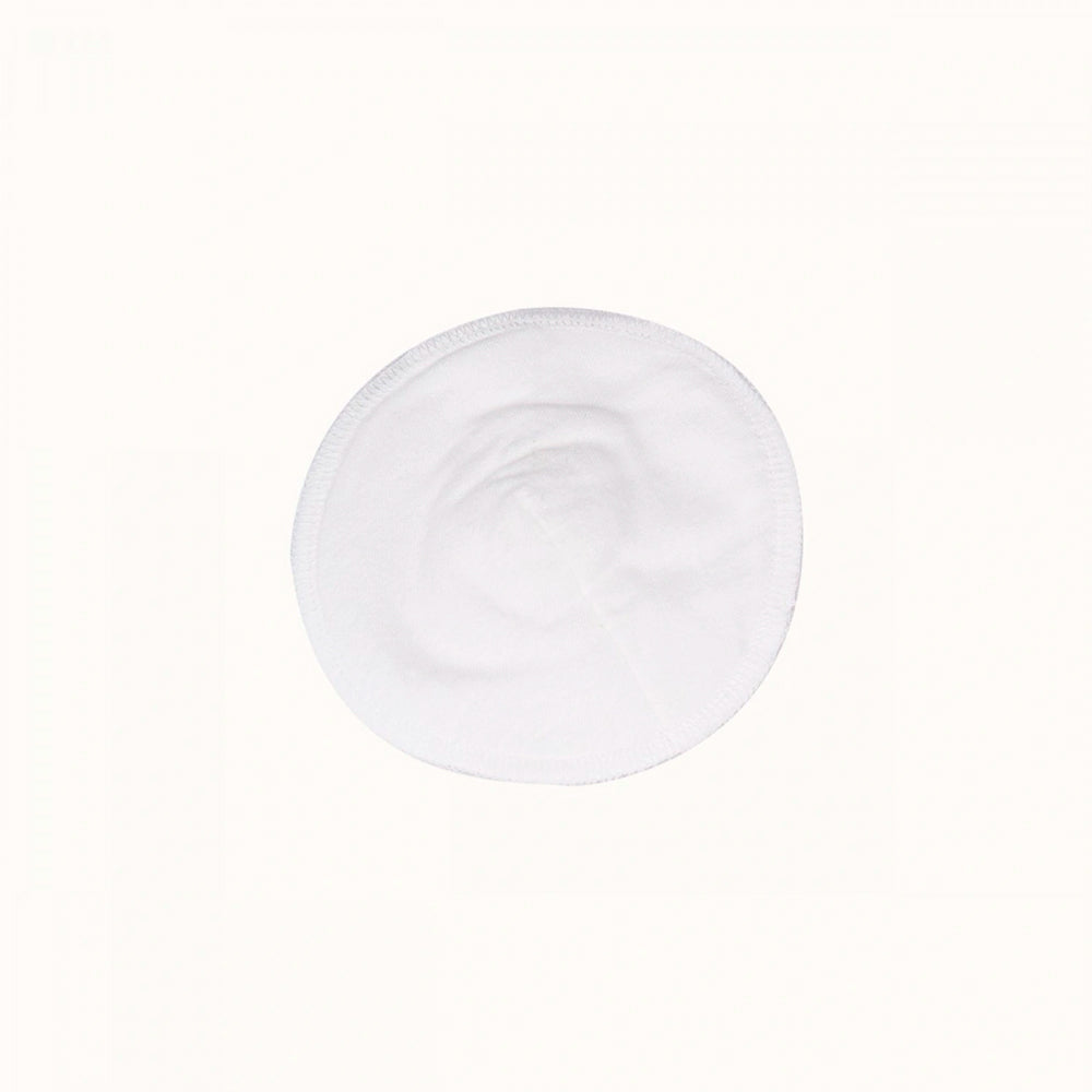 White circular nursing pad shown on a white background