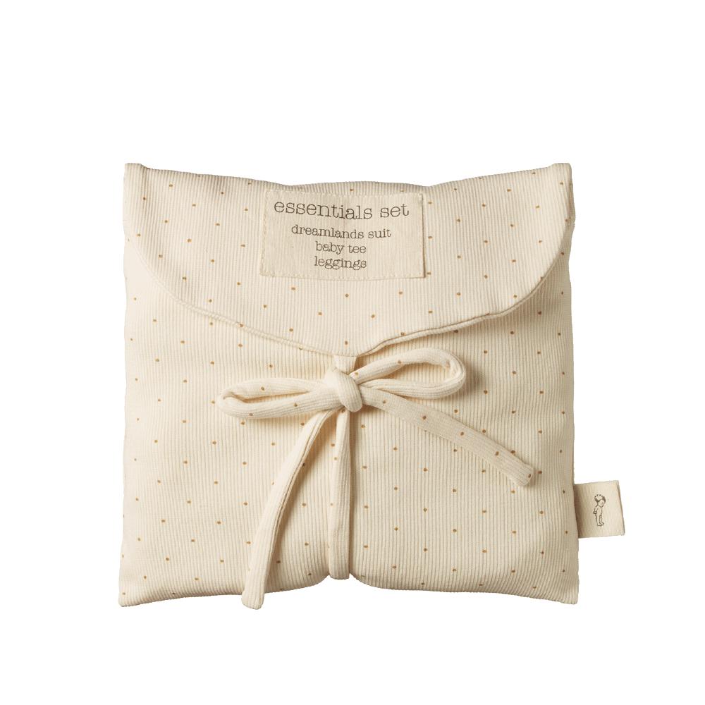 Cream fabric pouch with a bow and caramel coloured dots with nature baby branded tag on a white background