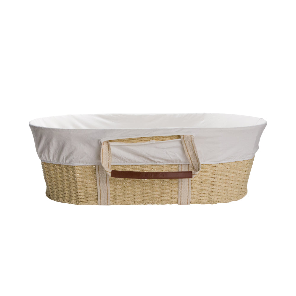 Wicker Moses basket with white cover on a white background