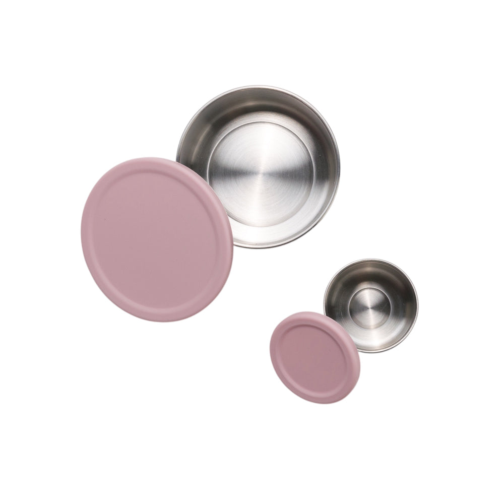 Stainless Steel dipper set with pink silicone lids on a white background