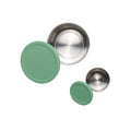 Stainless Steel dipper set with sage green silicone lids on a white background